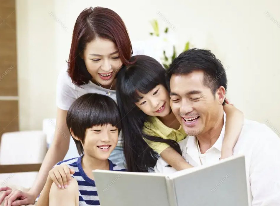 Family reading together at home