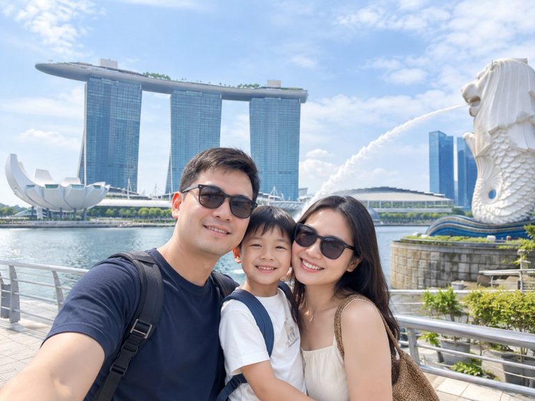 Singapore family taking a selfie by Marina Bay